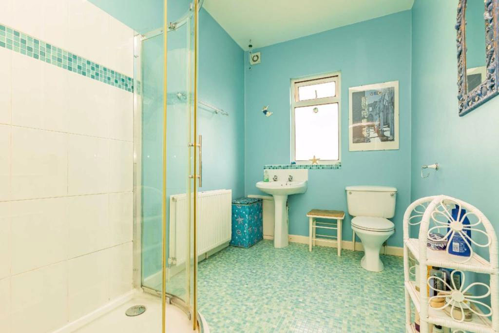 Family bathroom with beige tiles and basic fittings before full redesign by Ivywell Interiors in a Bishopston Victorian terrace.